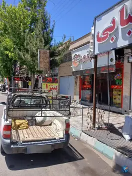 عکس پیتزا ساندویچ تیک تاک در خیابان کاشانی کرمان 2