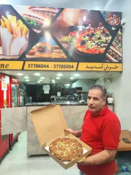 عکس پیتزا ساندویچ آفتاب در محله چهار امامزاده قم 2