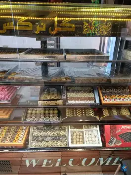 عکس شیرینی گل نرگس، محله شهر قائم، قم 10