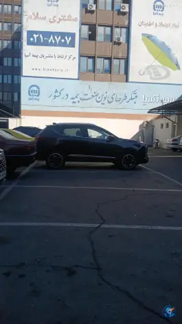 پارکینگ خسارت بیمه آسیا، محله ولیعصر، تهران